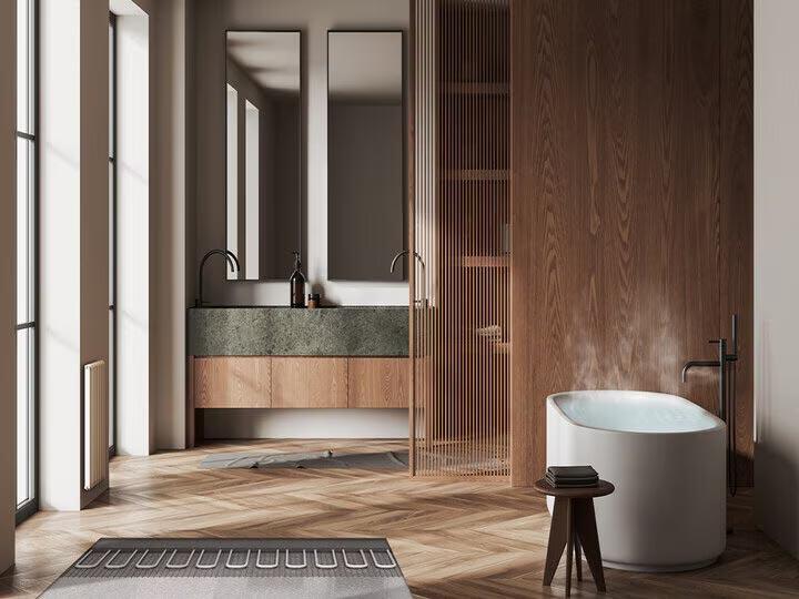 Eine Badezimmer mit einer dampfenden Badewanne die über die Samsung Wärmepumpe beheizt wurde